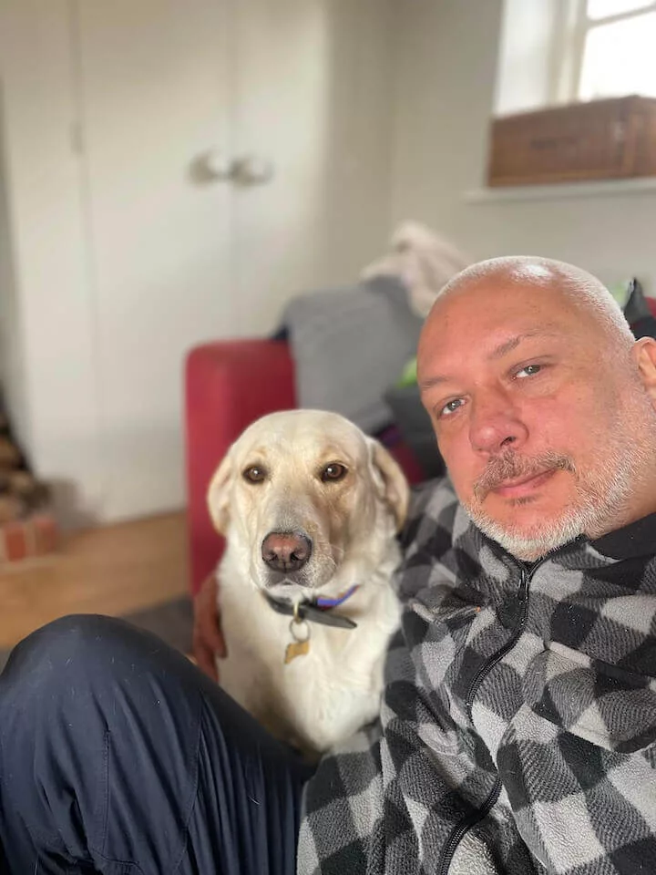 Pet sitter with a golden labrador